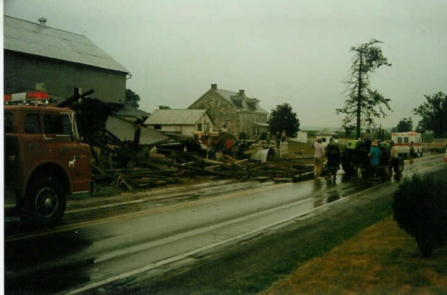 A severe thunderstorm collapsed this barn at the Blank Farm on to Route 340 west of Springhead Road... 7/17/88